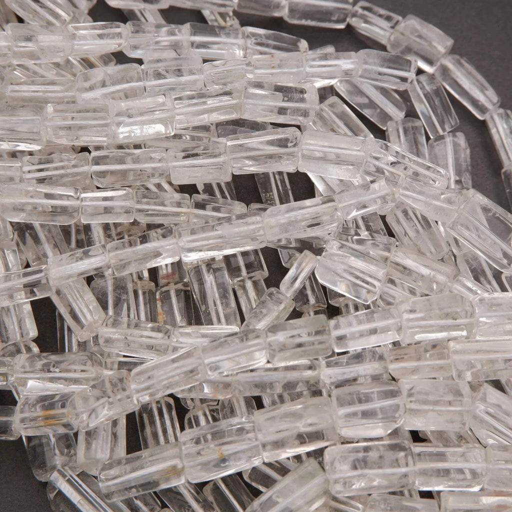Close-up of clear plastic connectors on a dark background