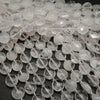 Translucent coin shape beads.