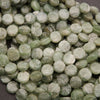 Close-up of green kyanite beads