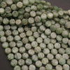 Close-up of green kyanite beads