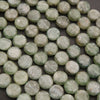 Close-up of green kyanite beads