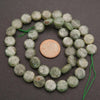 Close-up of green kyanite beads