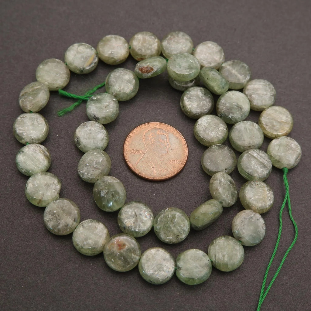Close-up of green kyanite beads