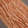 Close-up of pink beads on a gray background