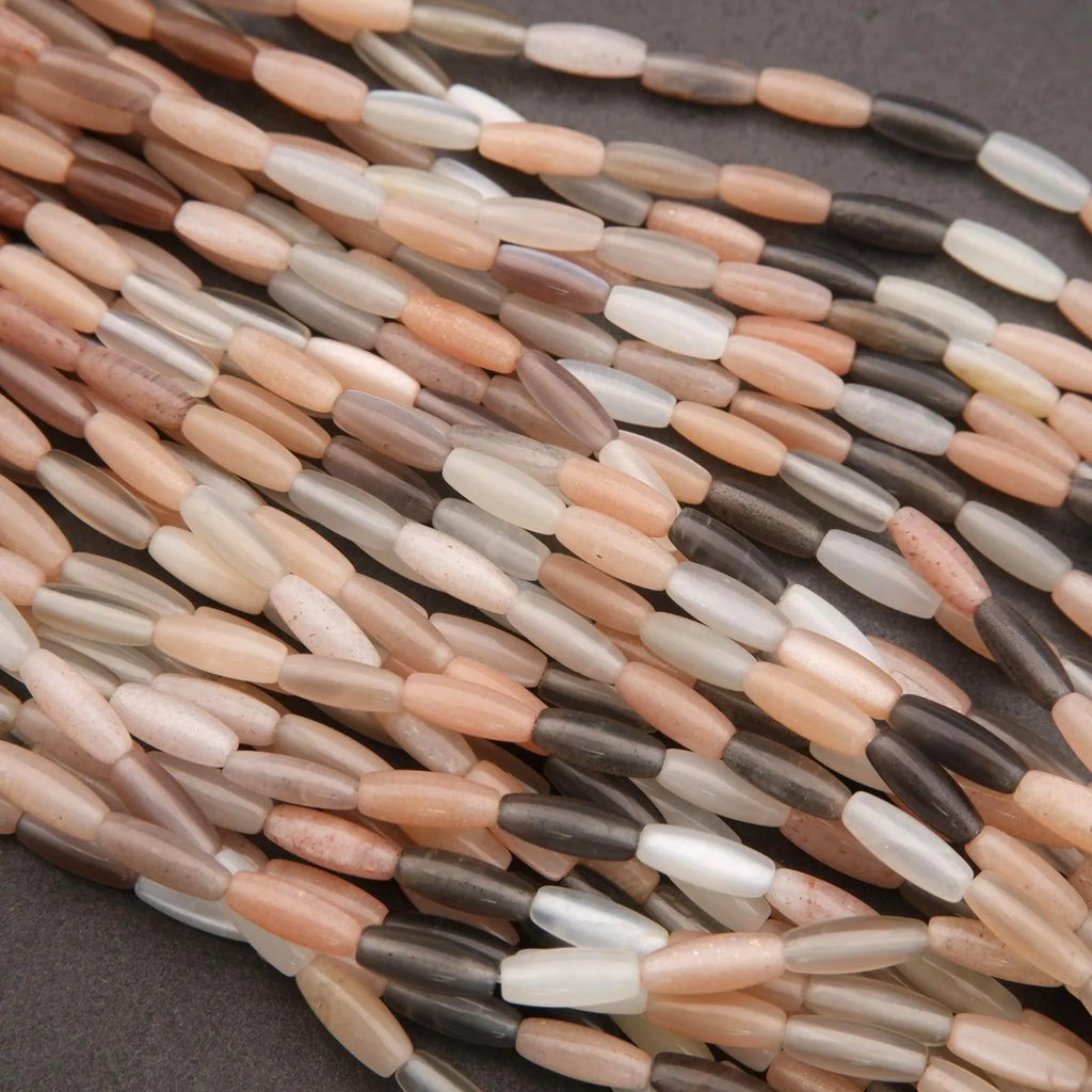 Close-up of a string of multicolored beads on a dark background