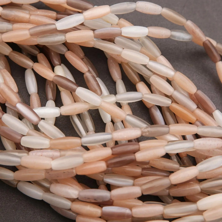 Close-up of a string of multicolored beads on a dark background
