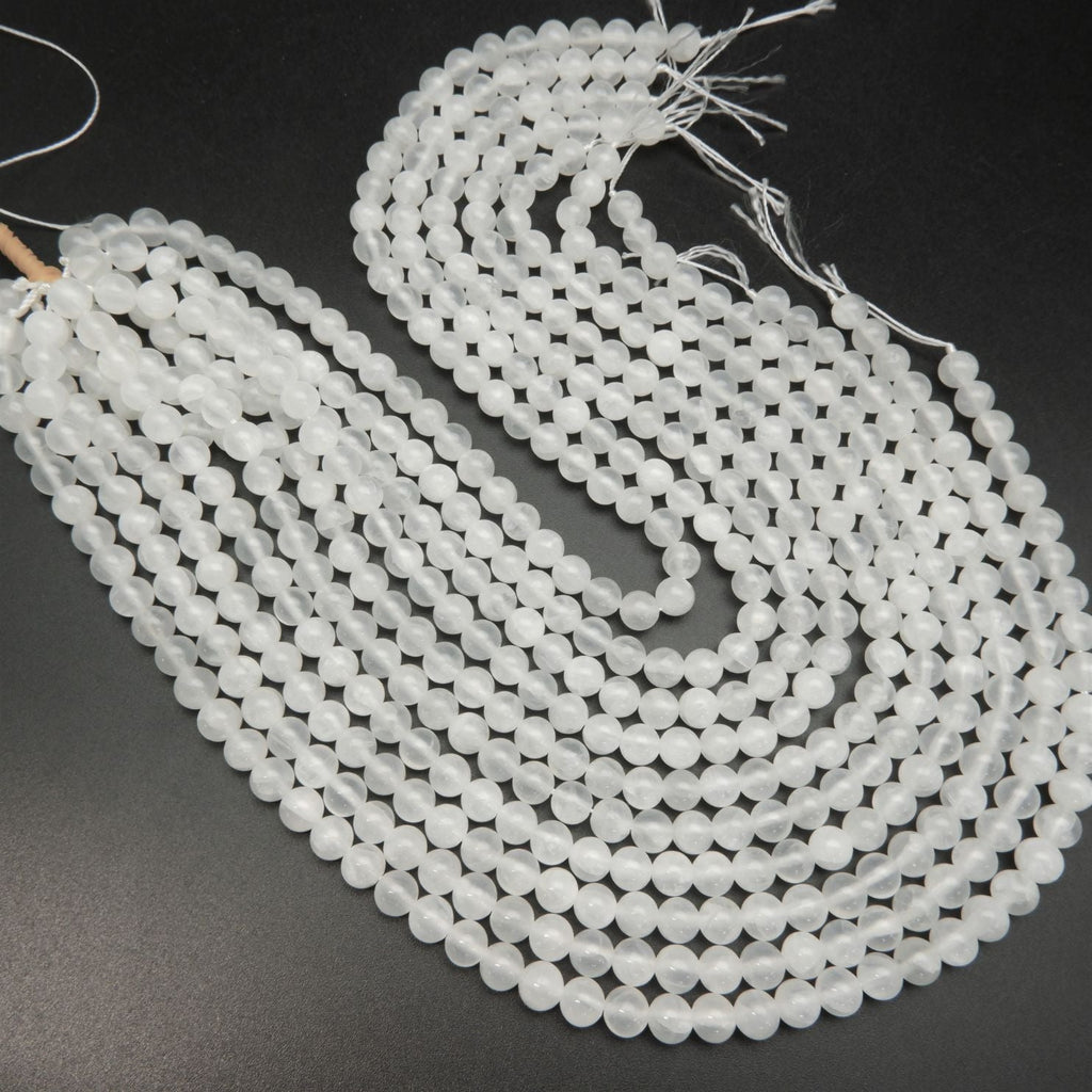 White selenite beads.