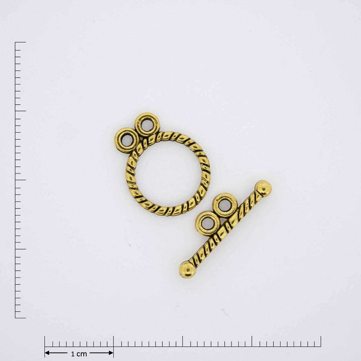 Gold double eye toggle clasp.