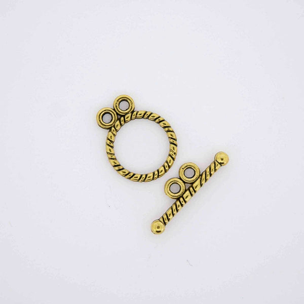 Gold double eye toggle clasp.