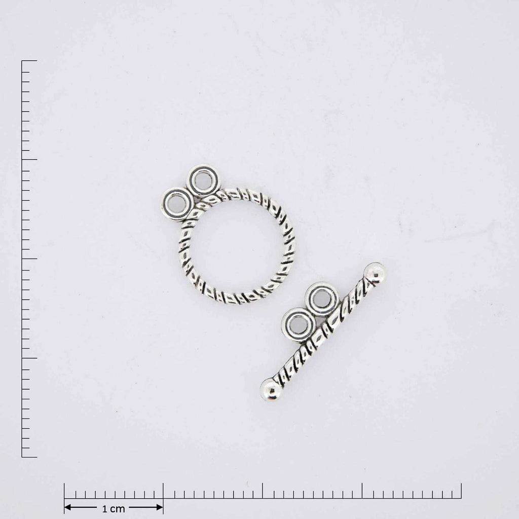 Silver jewelry clasp with double eyes.