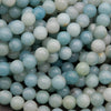 Close-up of light blue and green beads