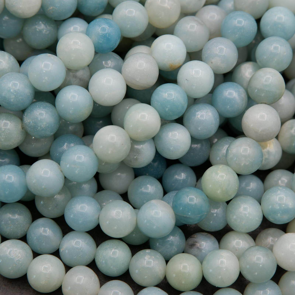 Close-up of light blue and green beads