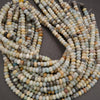 Multicolored bead strands on a gray background