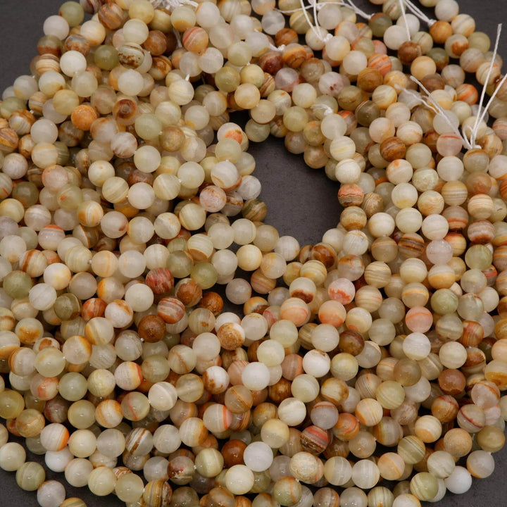 Close-up of multicolored beads on a dark background