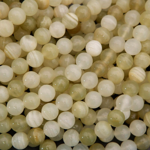 Close-up of beige and white marbled beads