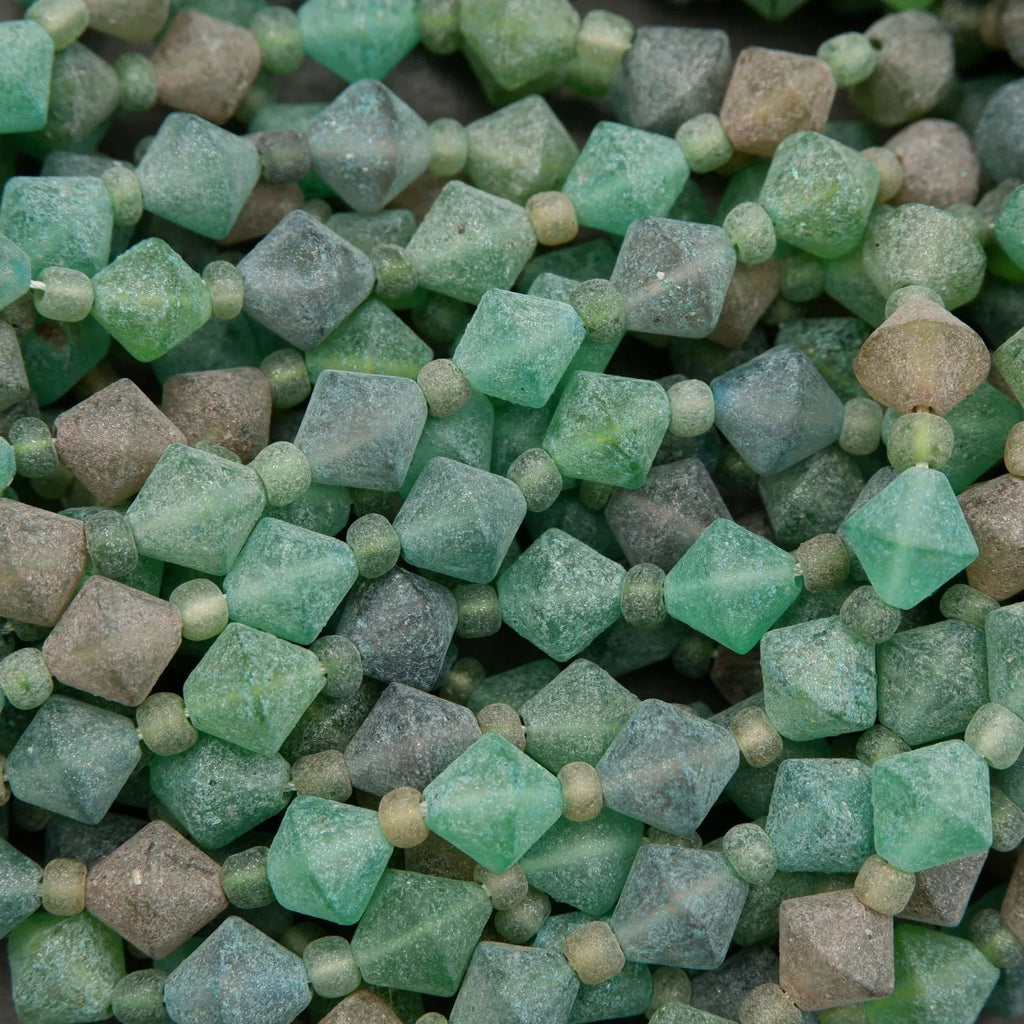 Close-up of green crystal-like beads and stones.