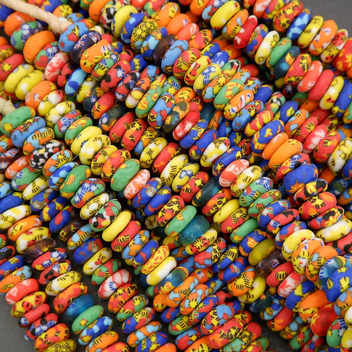 Colorful ceramic beads with various patterns and designs.