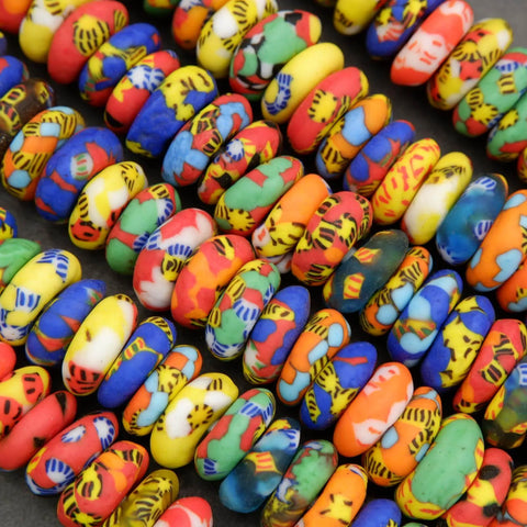 Colorful patterned beads on a dark background
