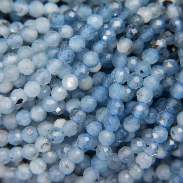 Microfaceted blue aquamarine beads.