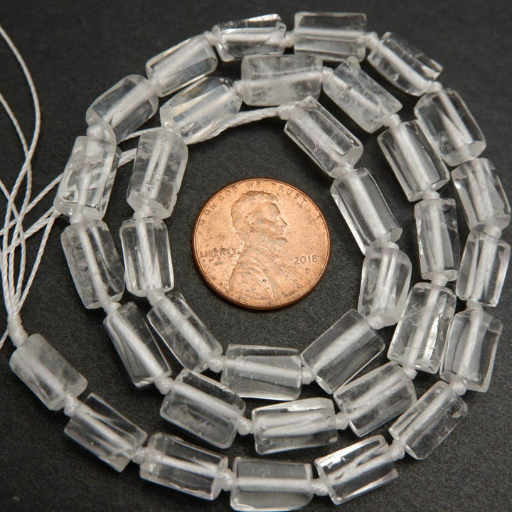 Freeform tube clear quartz beads.