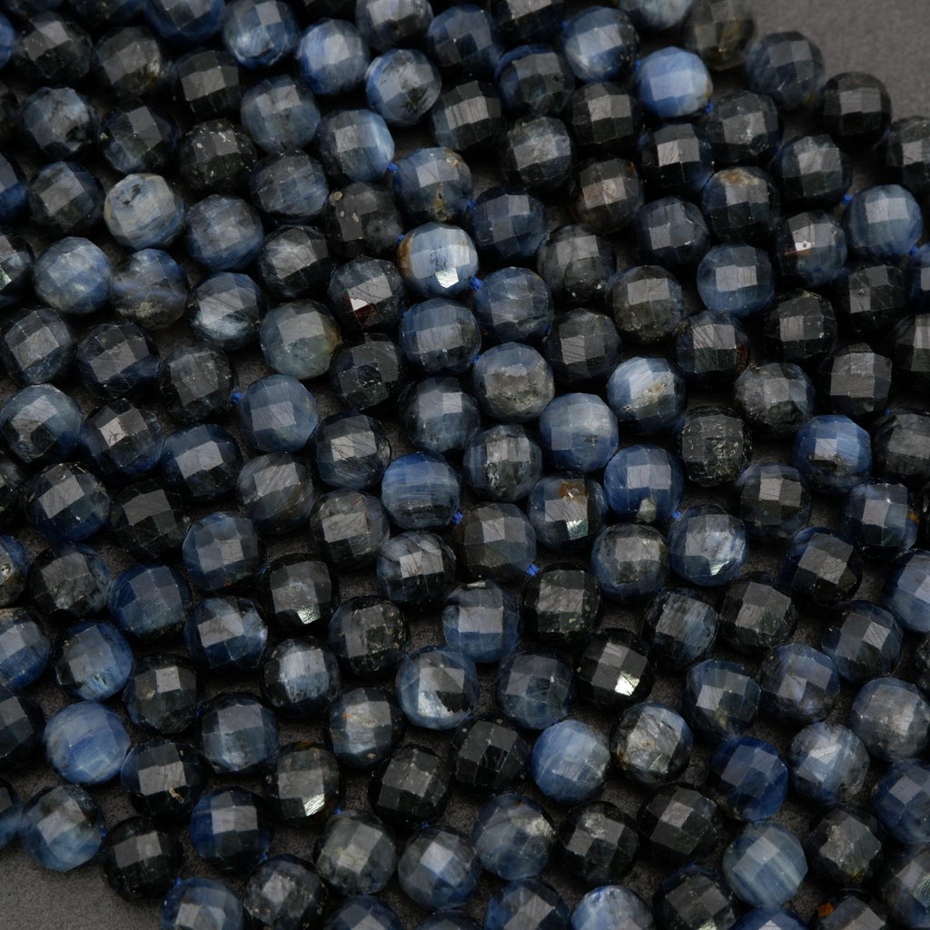 Faceted dark kyanite beads with organic texture and depth
