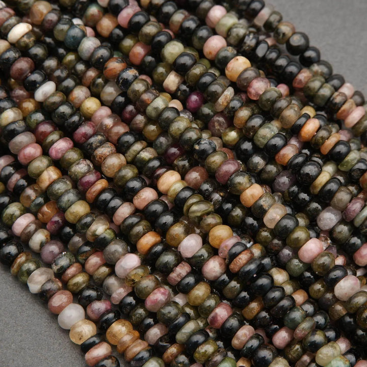 Multicolored beads on a gray background