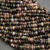 Close-up of multicolored beads on a gray background