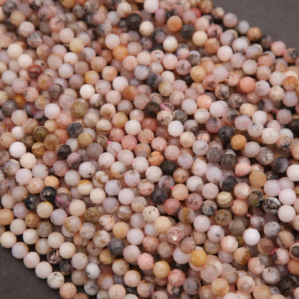 Close-up of multicolored small stones or beads on a dark background