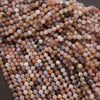 Close-up of multicolored round beads on a dark background