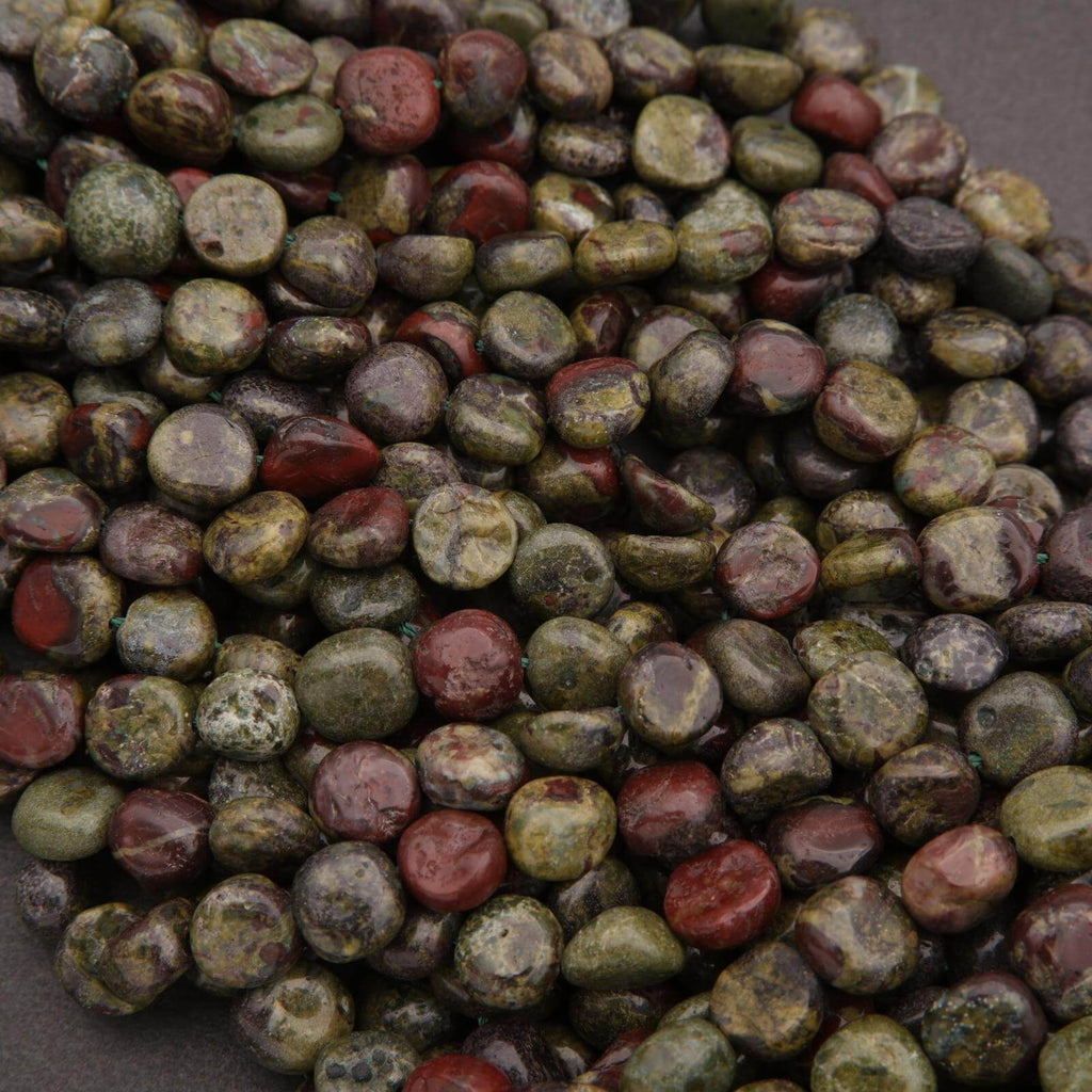 Close-up of a pile of multicolored stones on a dark background