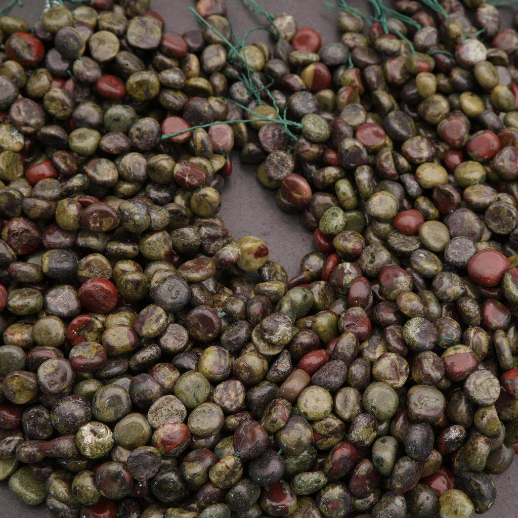 Close-up of multicolored lentils on a gray surface