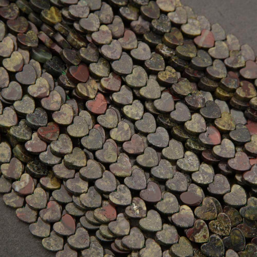 Close-up of heart-shaped beads on a dark background