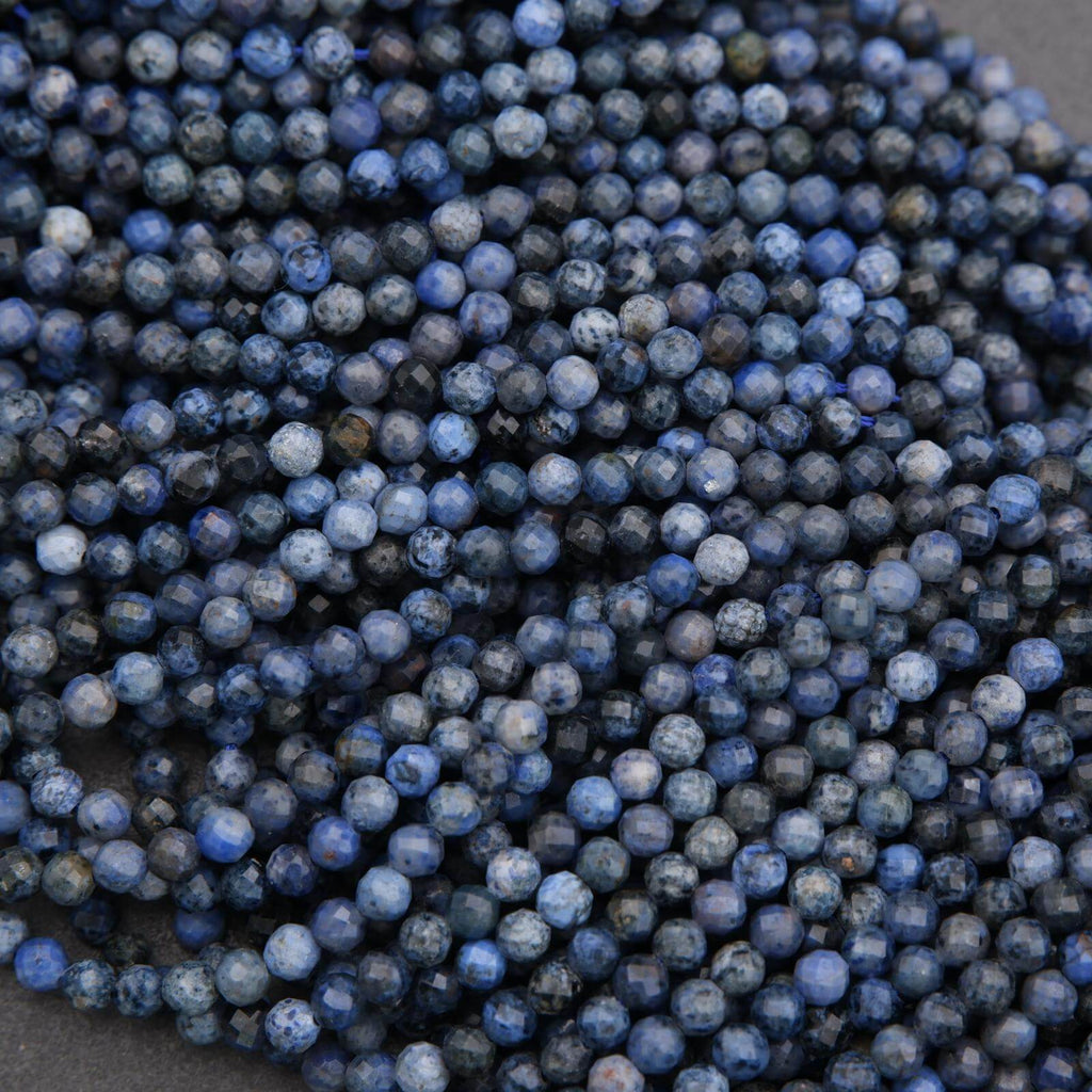 Close-up of blue beads on a dark background