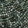 Close-up of green and gray beads