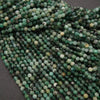 Close-up of green beads on a dark background