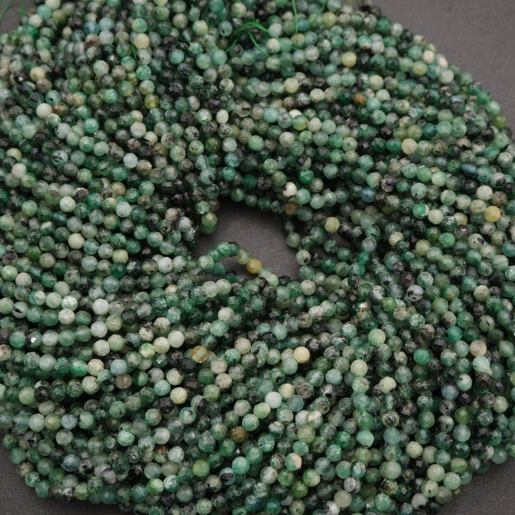 Close-up of a string of green beads on a dark background