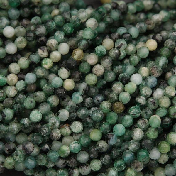 Close-up of green and black beads on a string