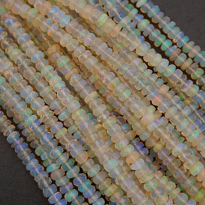 Close-up of opal beads on a dark background