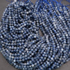String of blue beads on a gray background