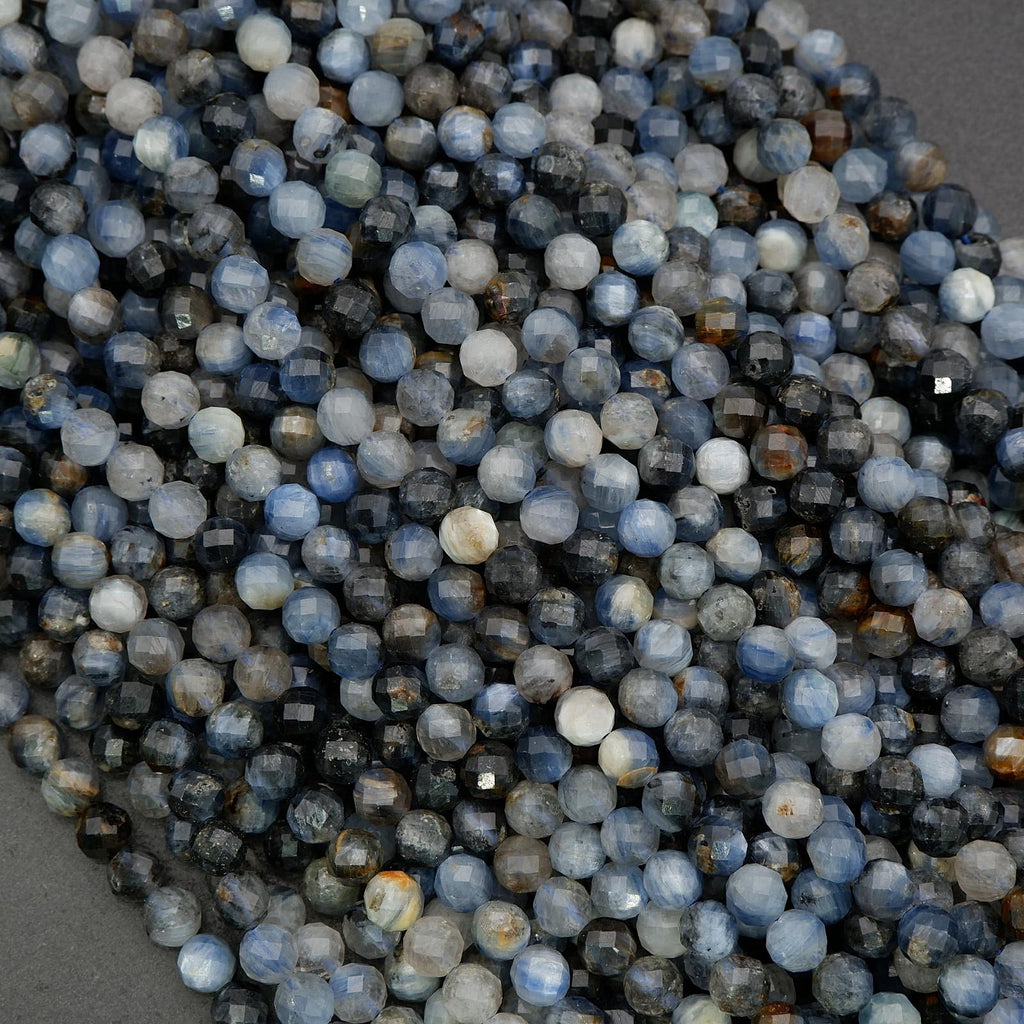 Natural blue kyanite gemstone beads showing mixed blue and gray tones