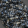 Faceted kyanite beads with organic color shifts and earthy inclusions