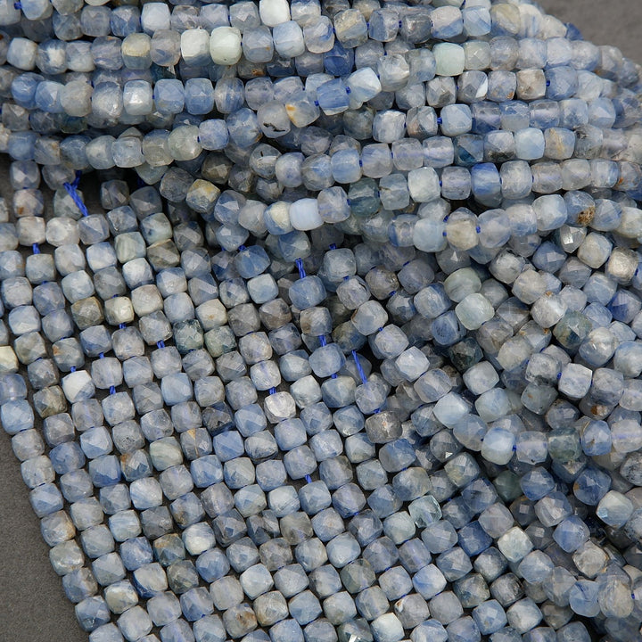 Blue kyanite beads with subtle marbling and crystalline texture