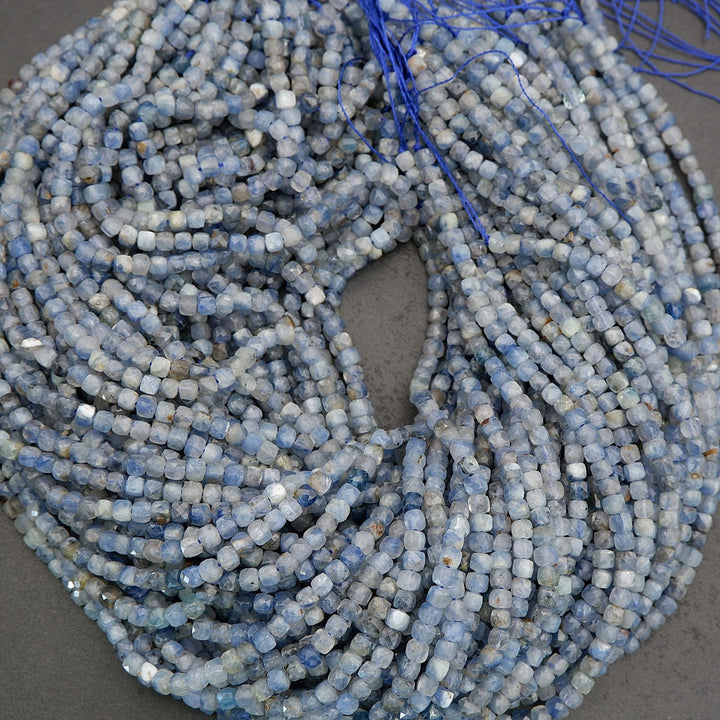 Strand of natural kyanite beads with pale blue and slate hues