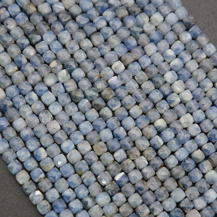 Detailed view of blue kyanite beads with organic color variation