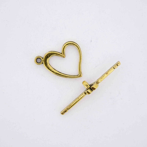 Gold heart toggle clasp.