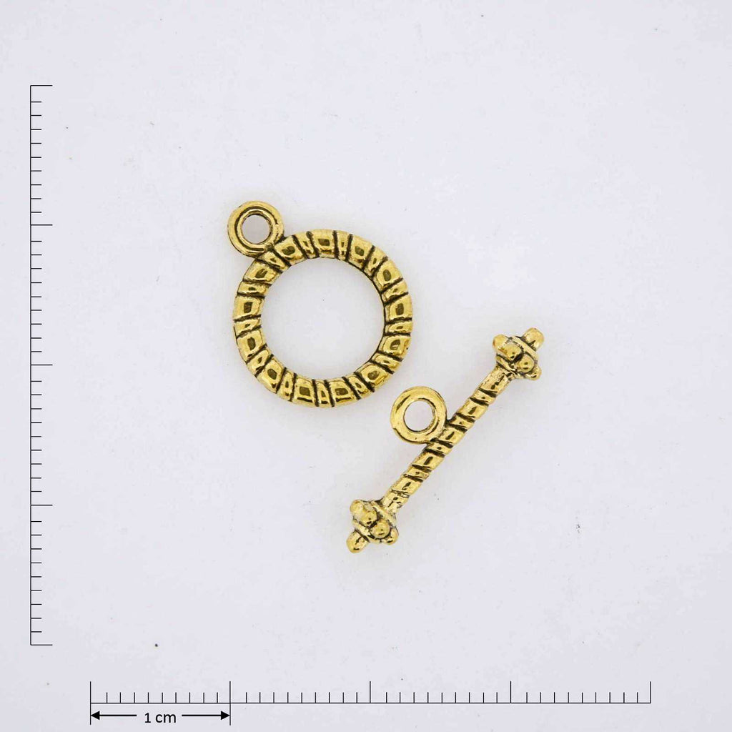 Gold toggle jewelry findings.