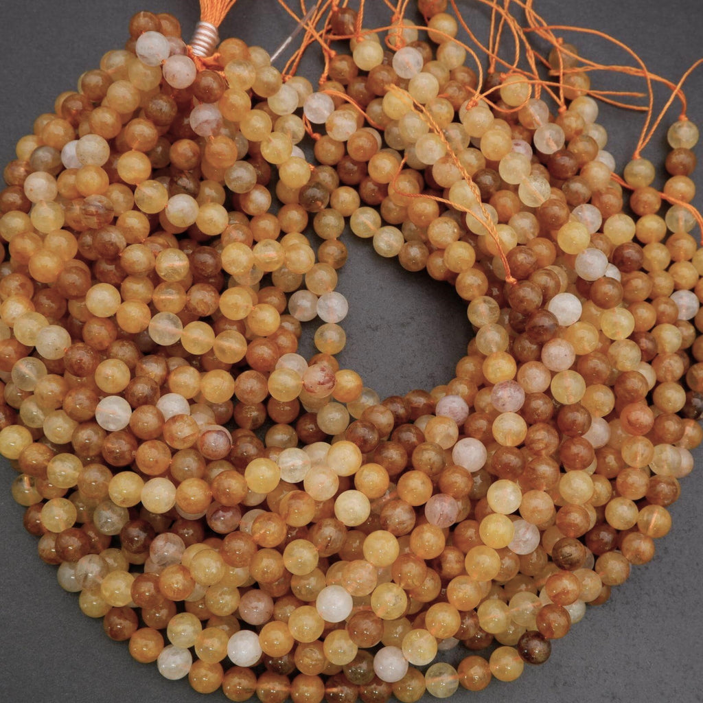 String of multicolored beads on a gray background