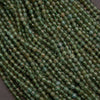 Close-up of green beads on a string