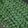Green aventurine bicone shape beads.