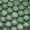 Green aventurine coin shape beads.